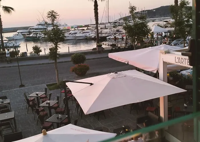 Aura Exclusive Fronte Mare Апартаменты Форио